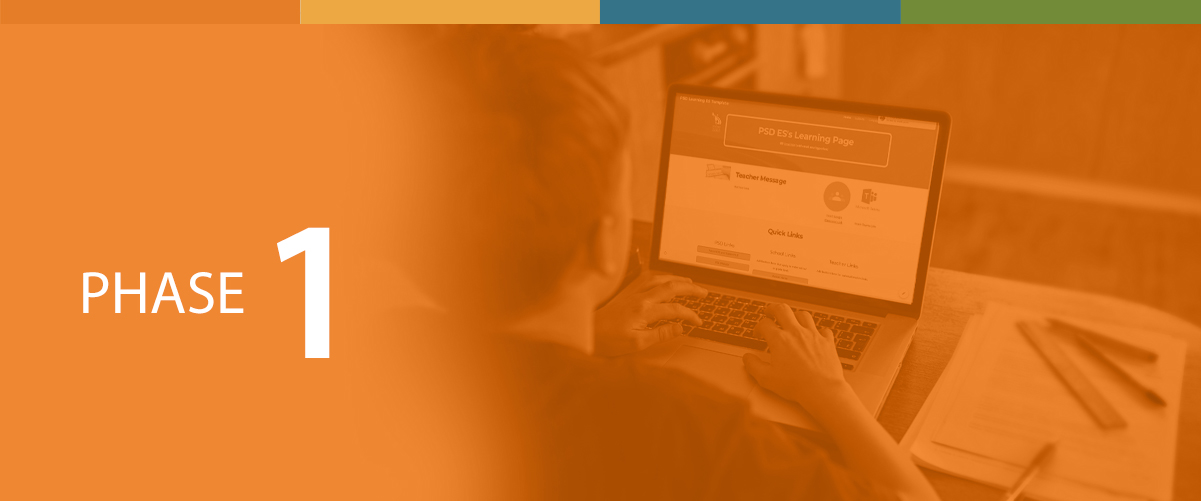 Student works on a laptop.