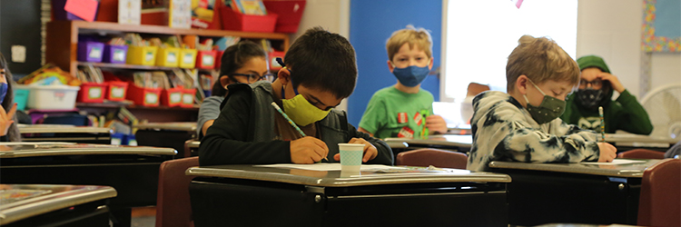 Bauder Elementary students working in a  classroom.