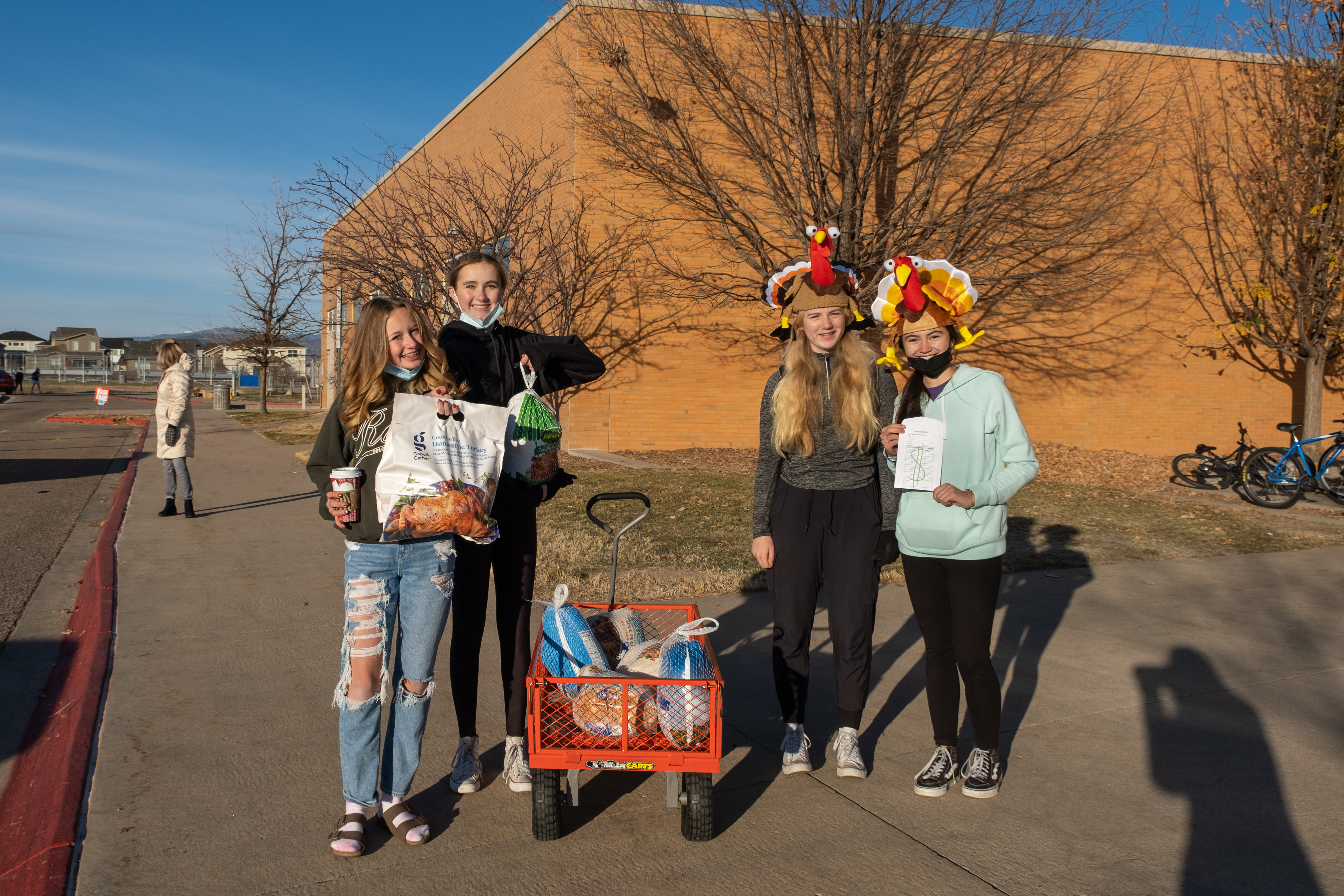 Students donate goods at the Kinard Turkey Round Up. 