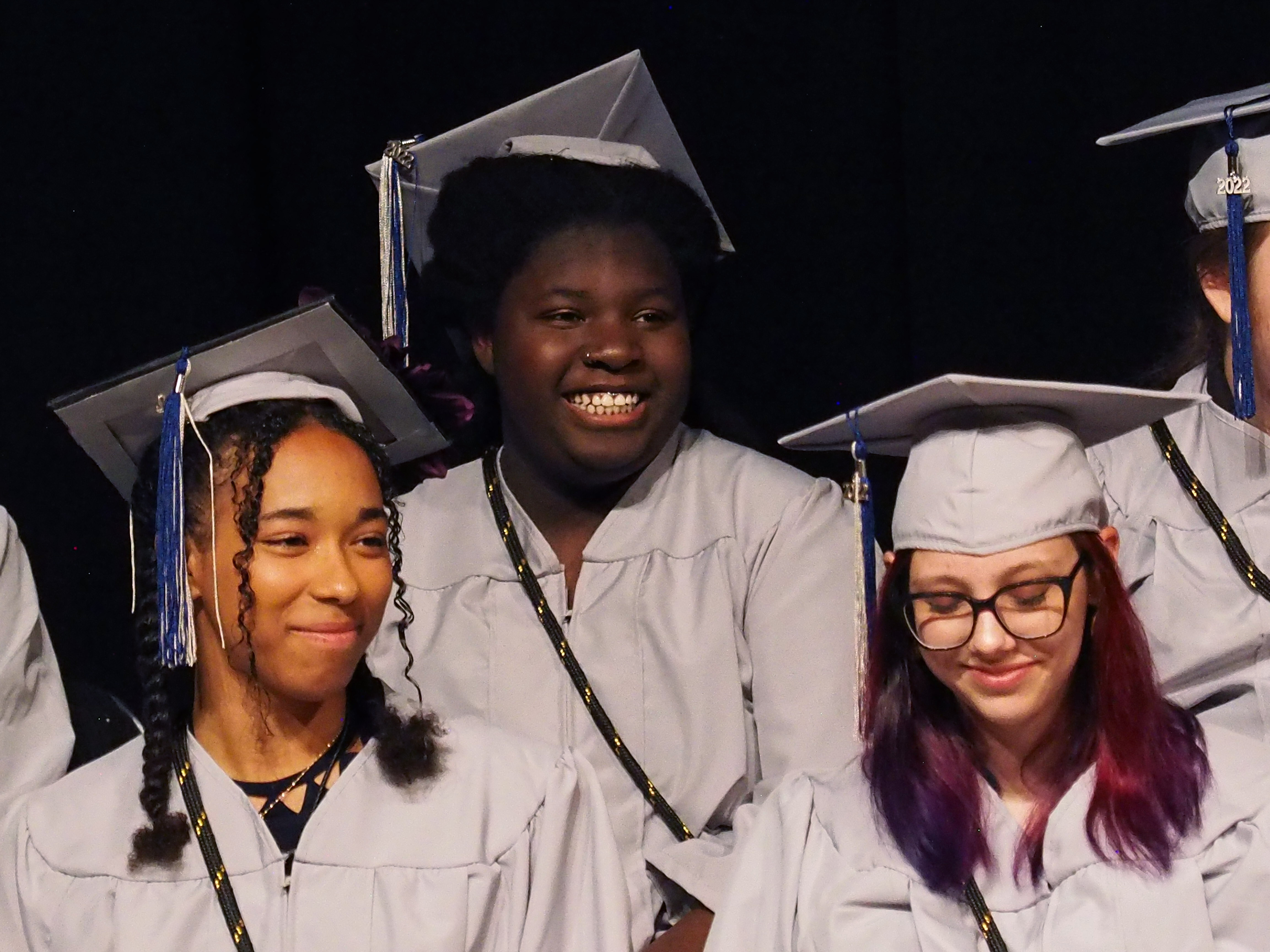 Polaris graduates smile together