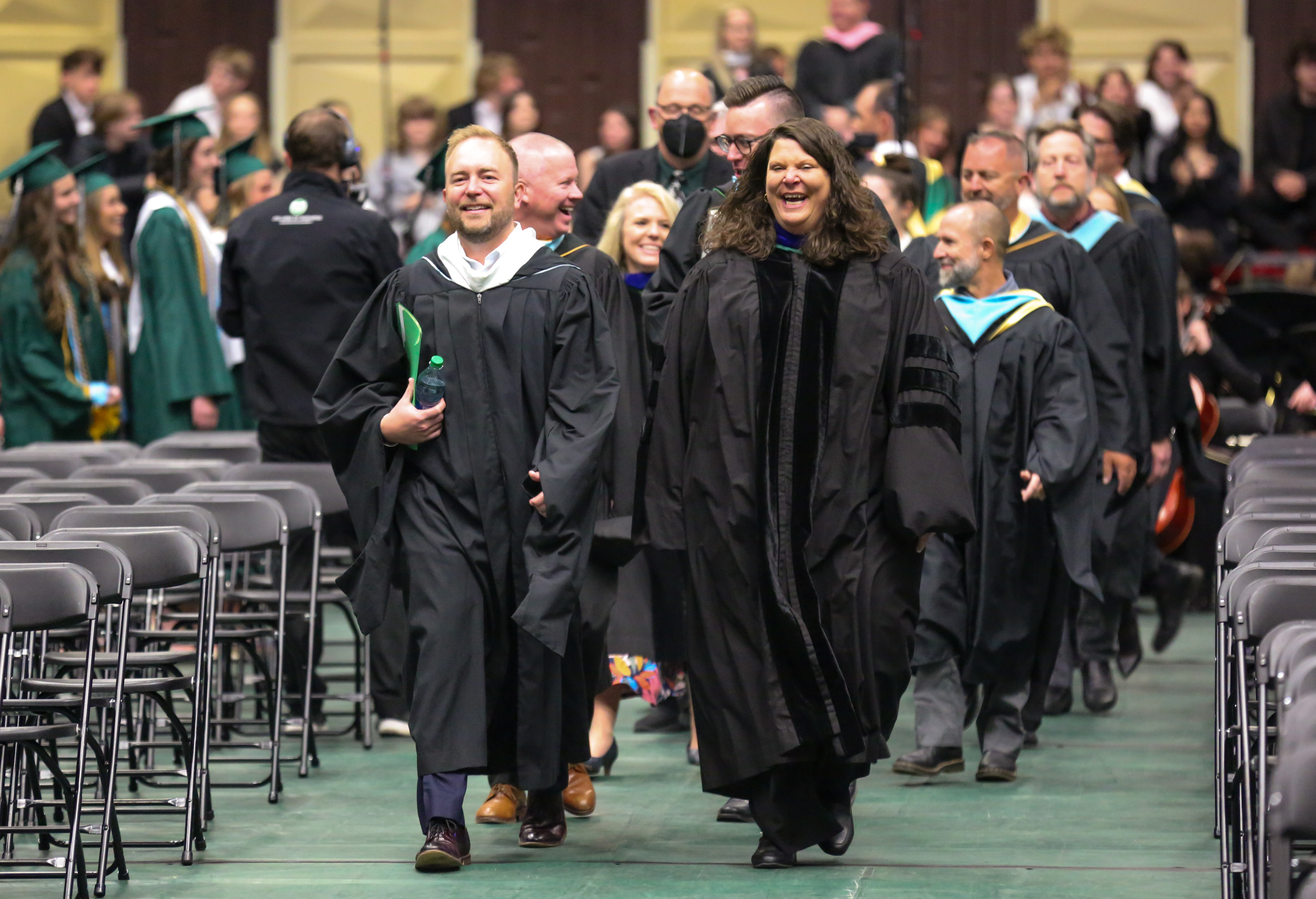 Superintendent Kingsley and Fossil Ridge High School principal lead the walk into Moby Arena.
