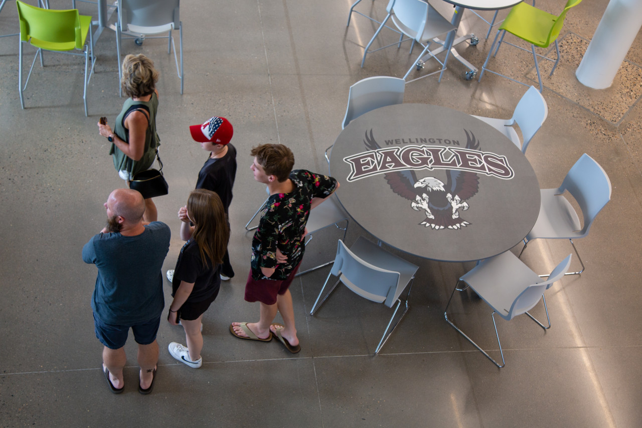 A family tours the building. 