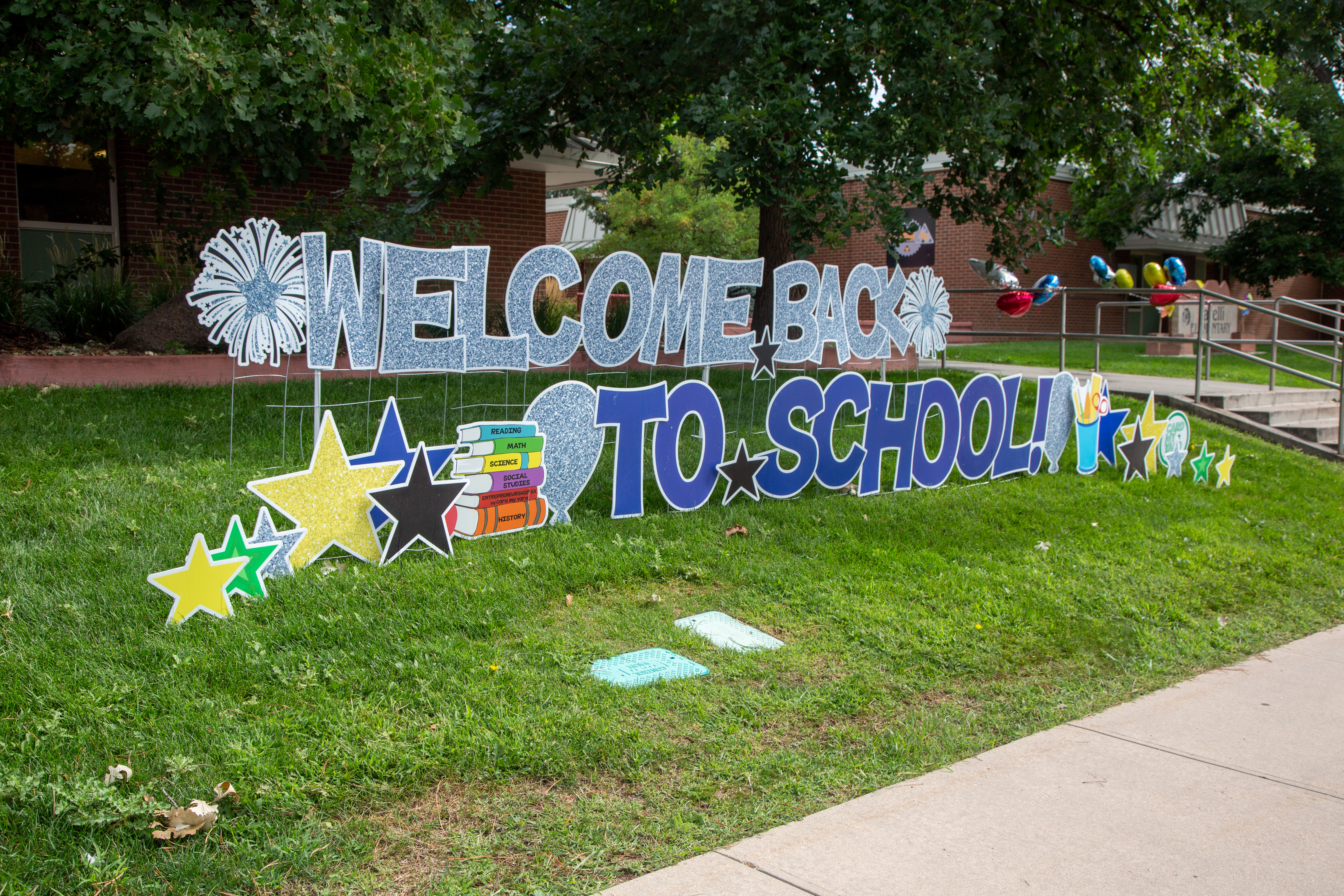Welcome Back to School sign in the school yard. 
