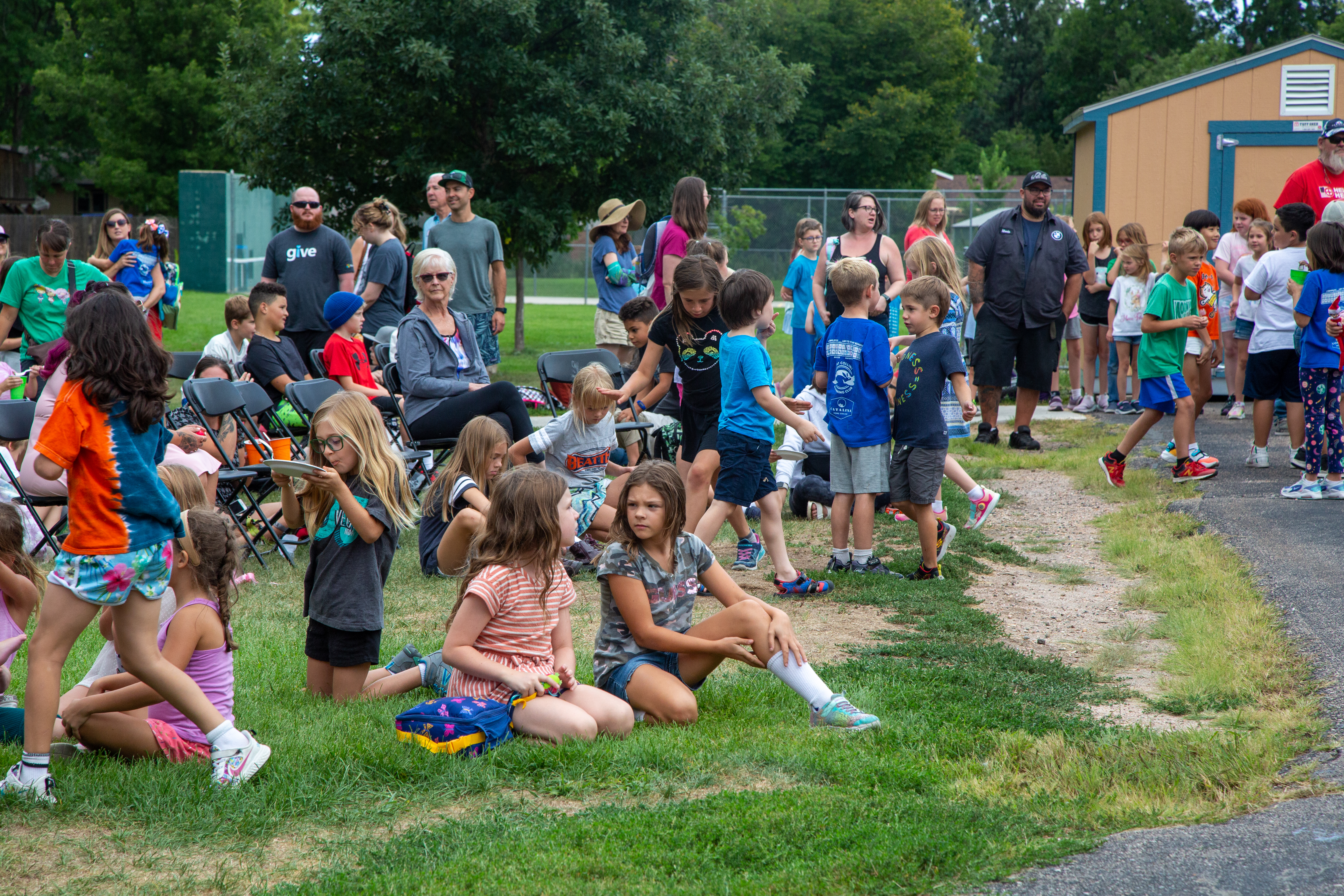 Beattie visitors on the school lawn during the celebration event. 