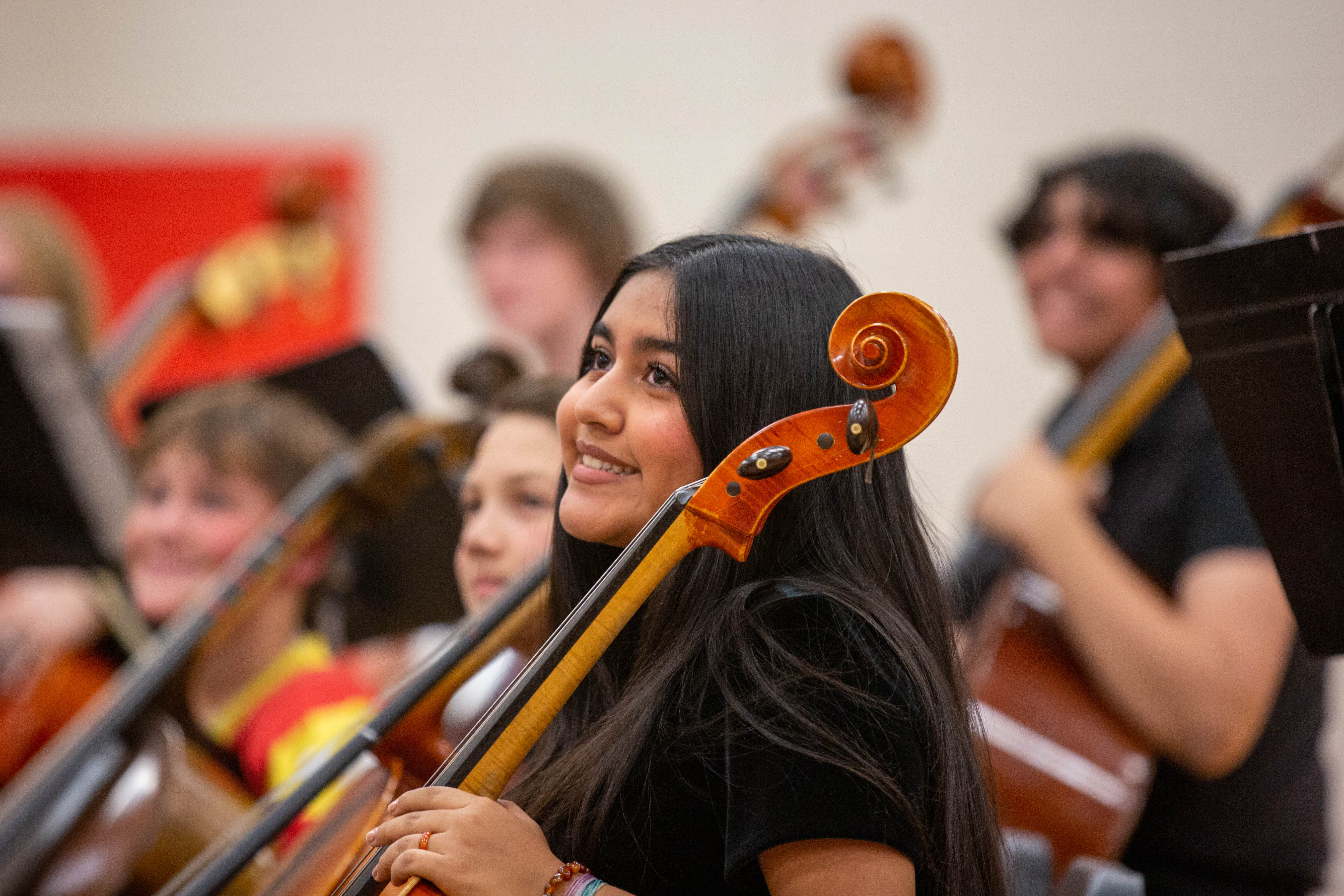 Students play music at the Boltz anniversary celebration. 