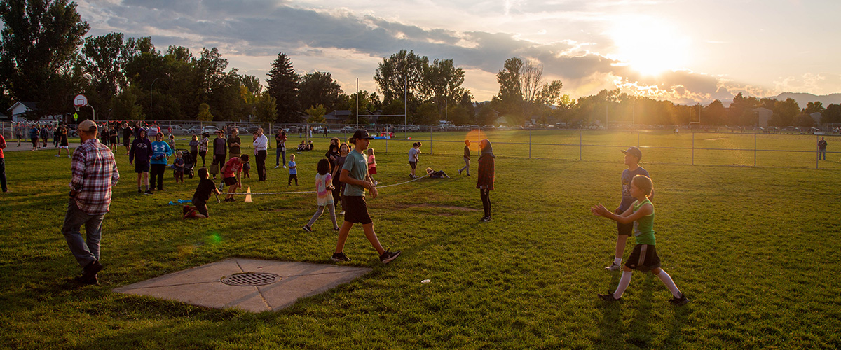 The Boltz community celebrates the 50th anniversary playing field games outside.