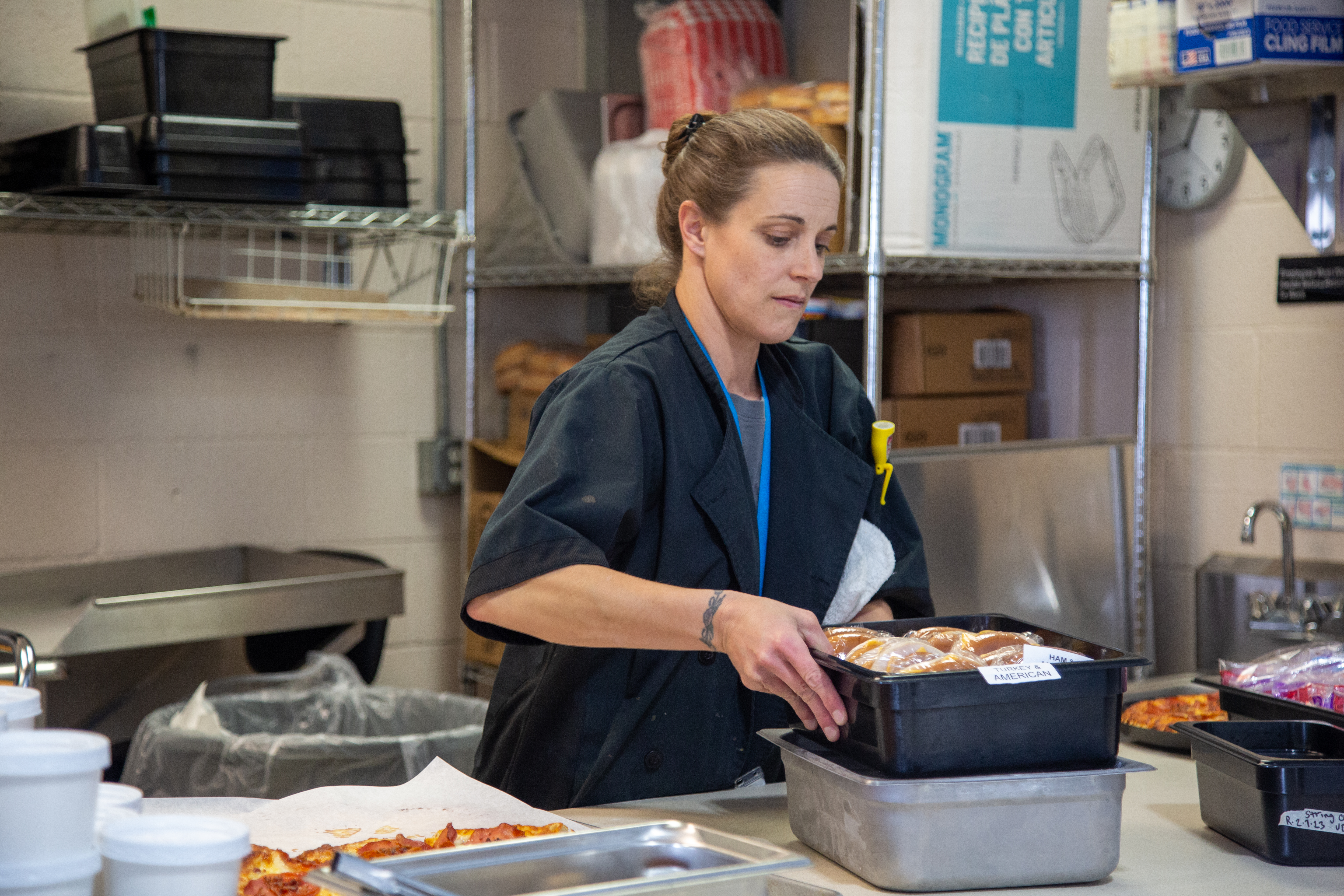 A food service staff member at Poudre Community Academy. 