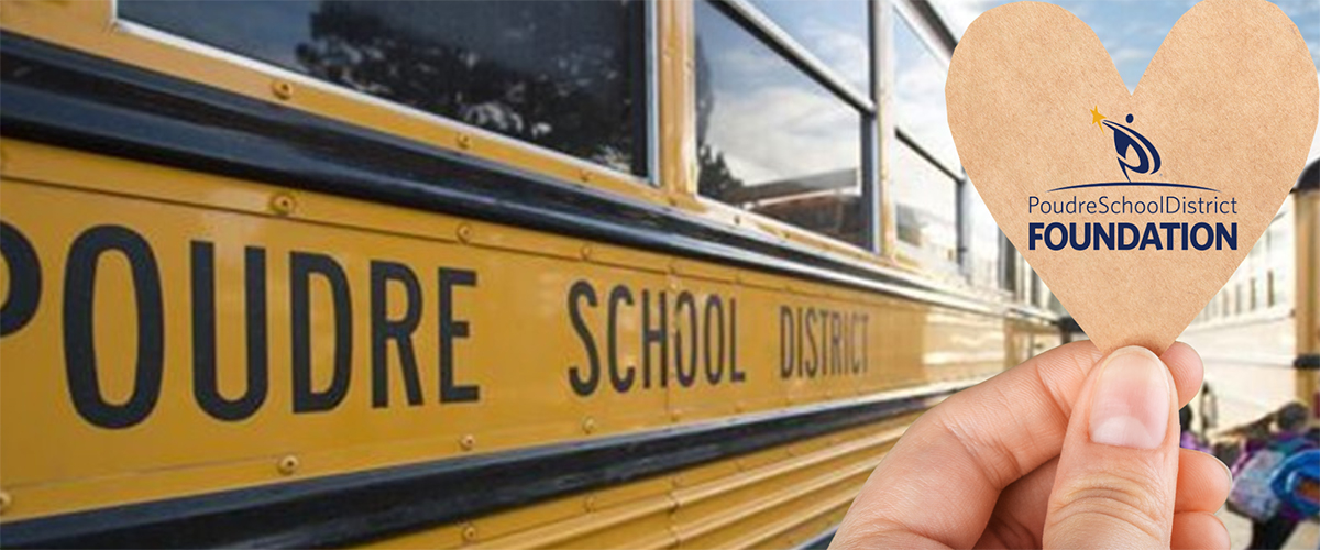 A heart held up by a school bus that says PSD Foundation