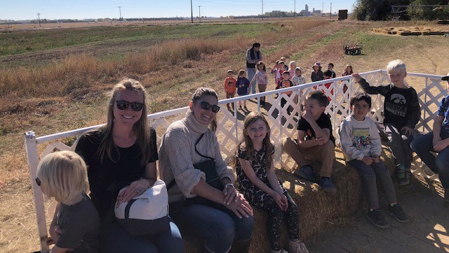 Volunteers help out on a field trip. 