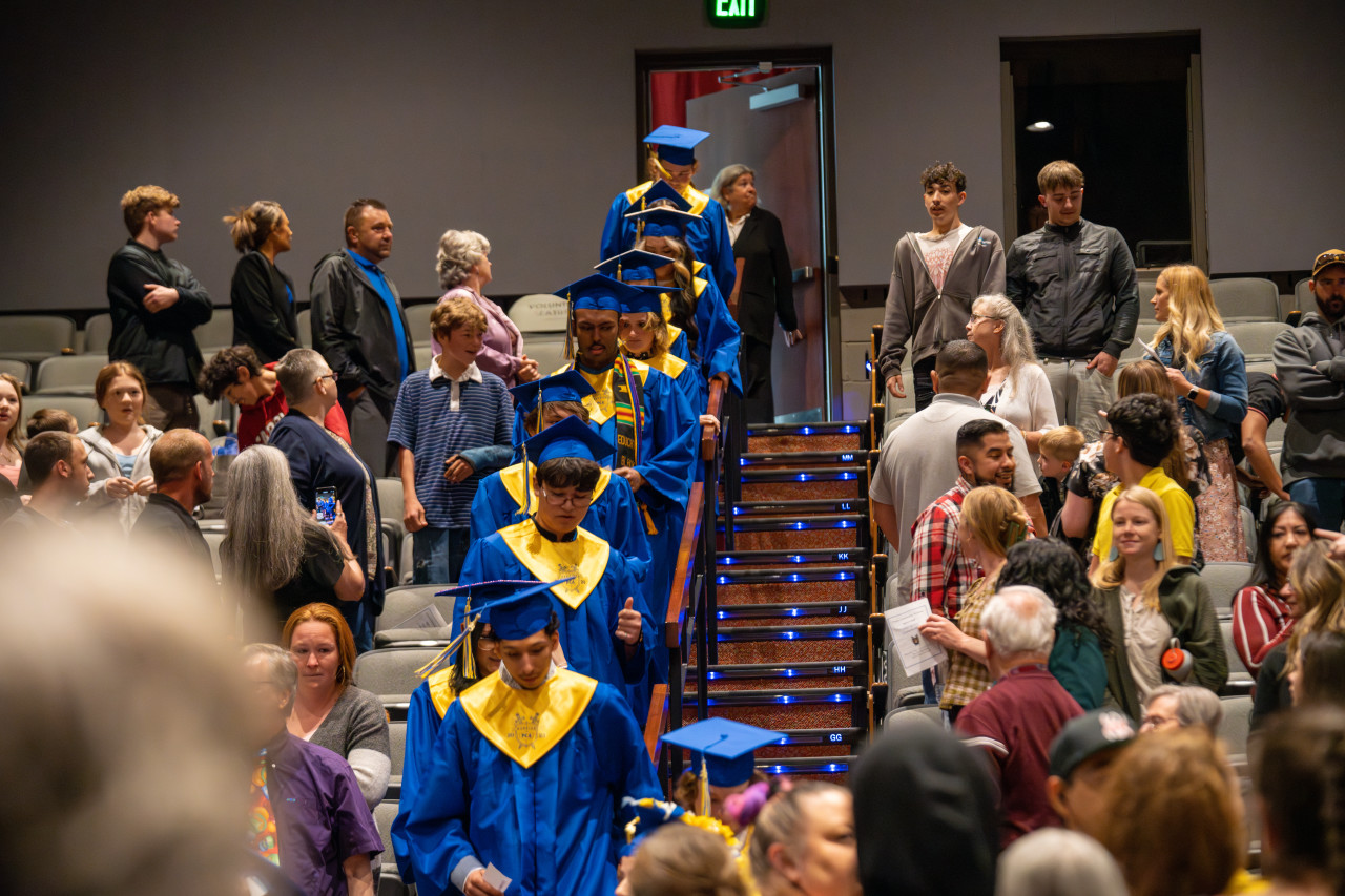 Poudre Community Academy grads walk in to the ceremony. 