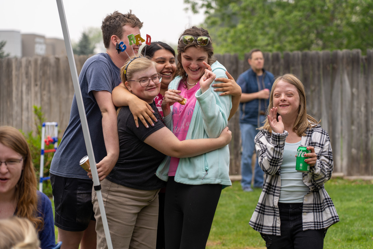 Cooper Home program graduates celebrate together. 