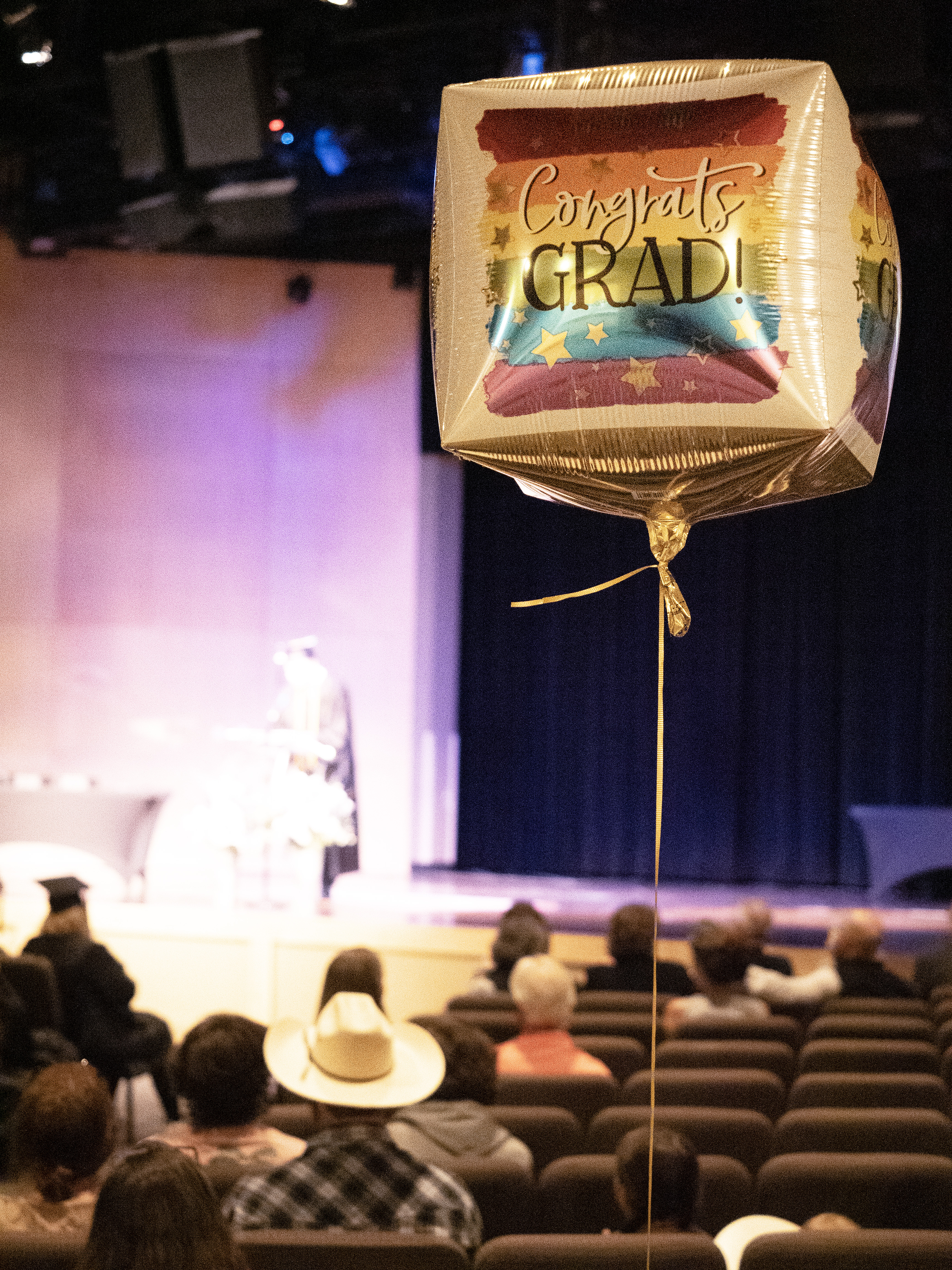 The audience at a "Congrats Grad" balloon at the OU ceremony. 