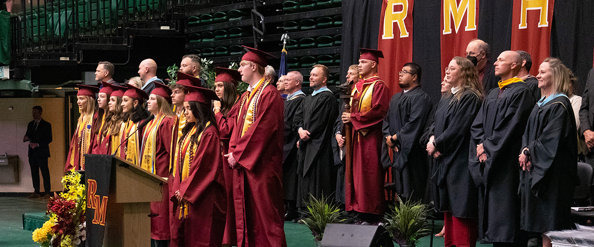 Rocky Mountain High School graduates on stage at Moby Arena.