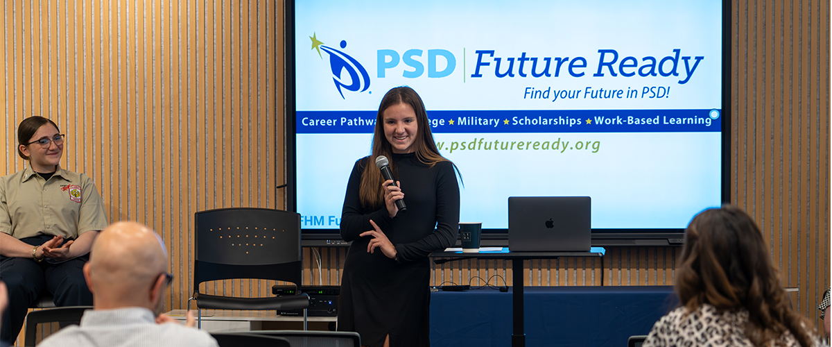 A student presents at the Future Ready Center opening. 