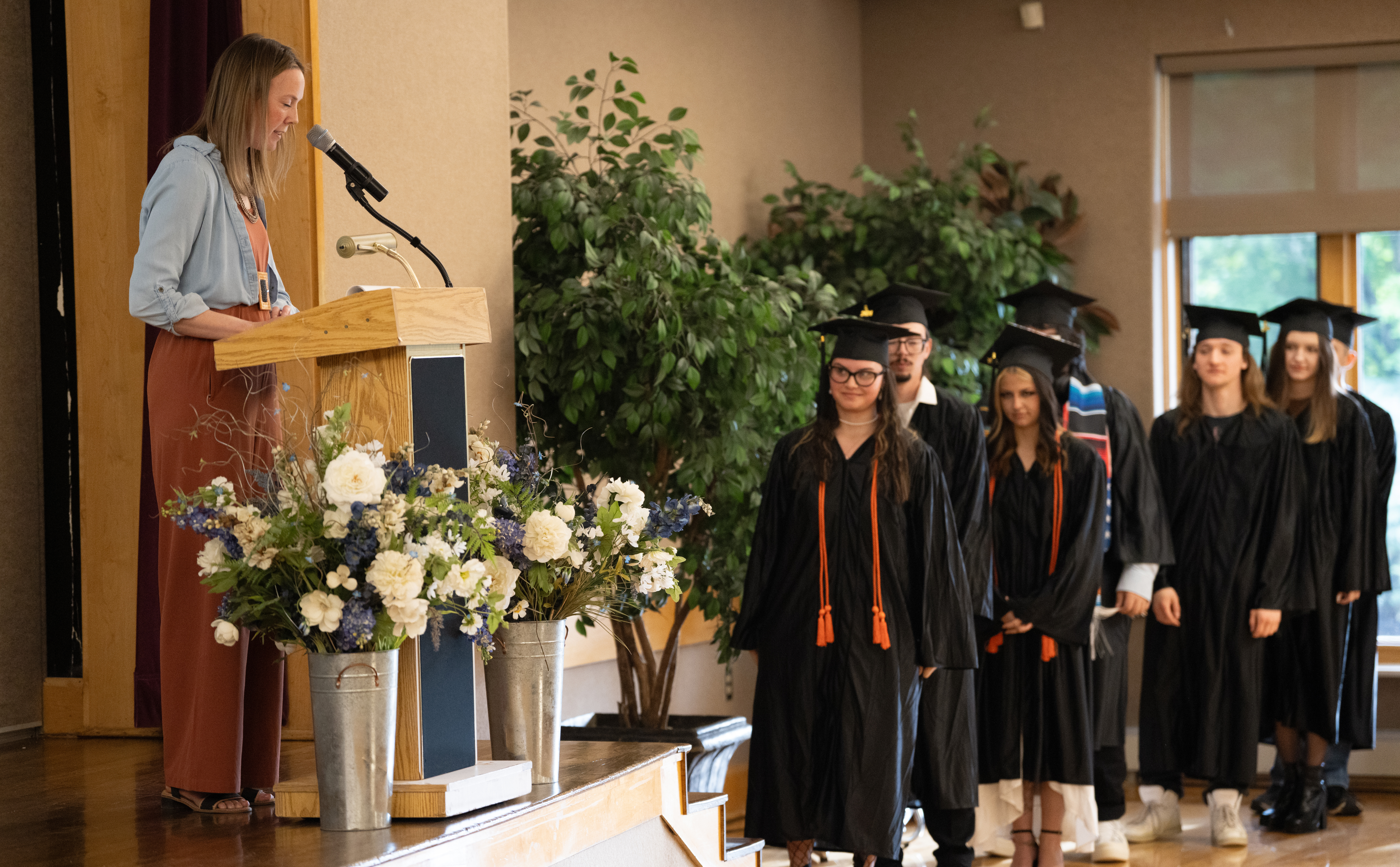 Opportunities Unlimited graduates walk to receive their diplomas.