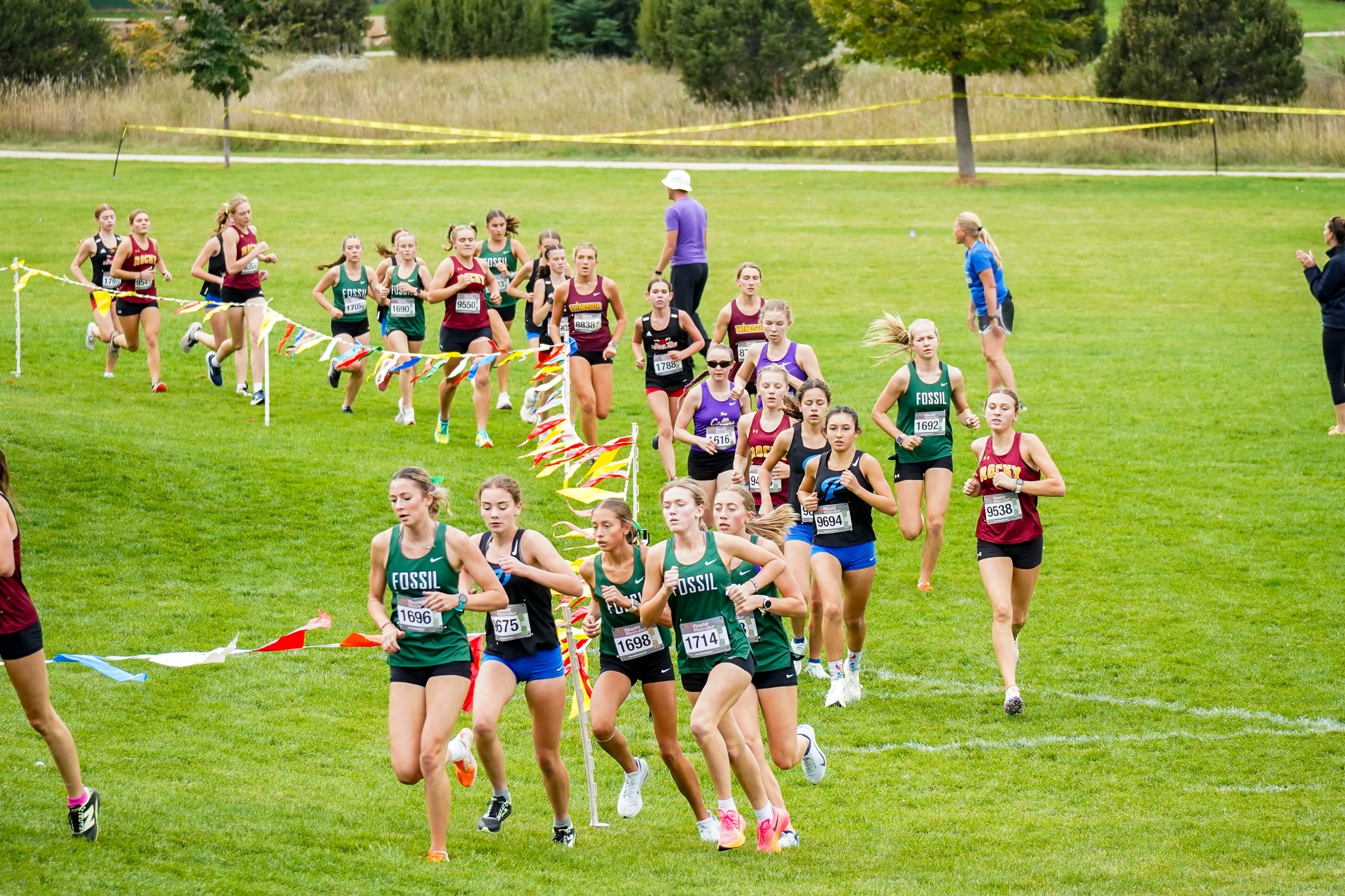 High School Girls Cross Country Runners racing