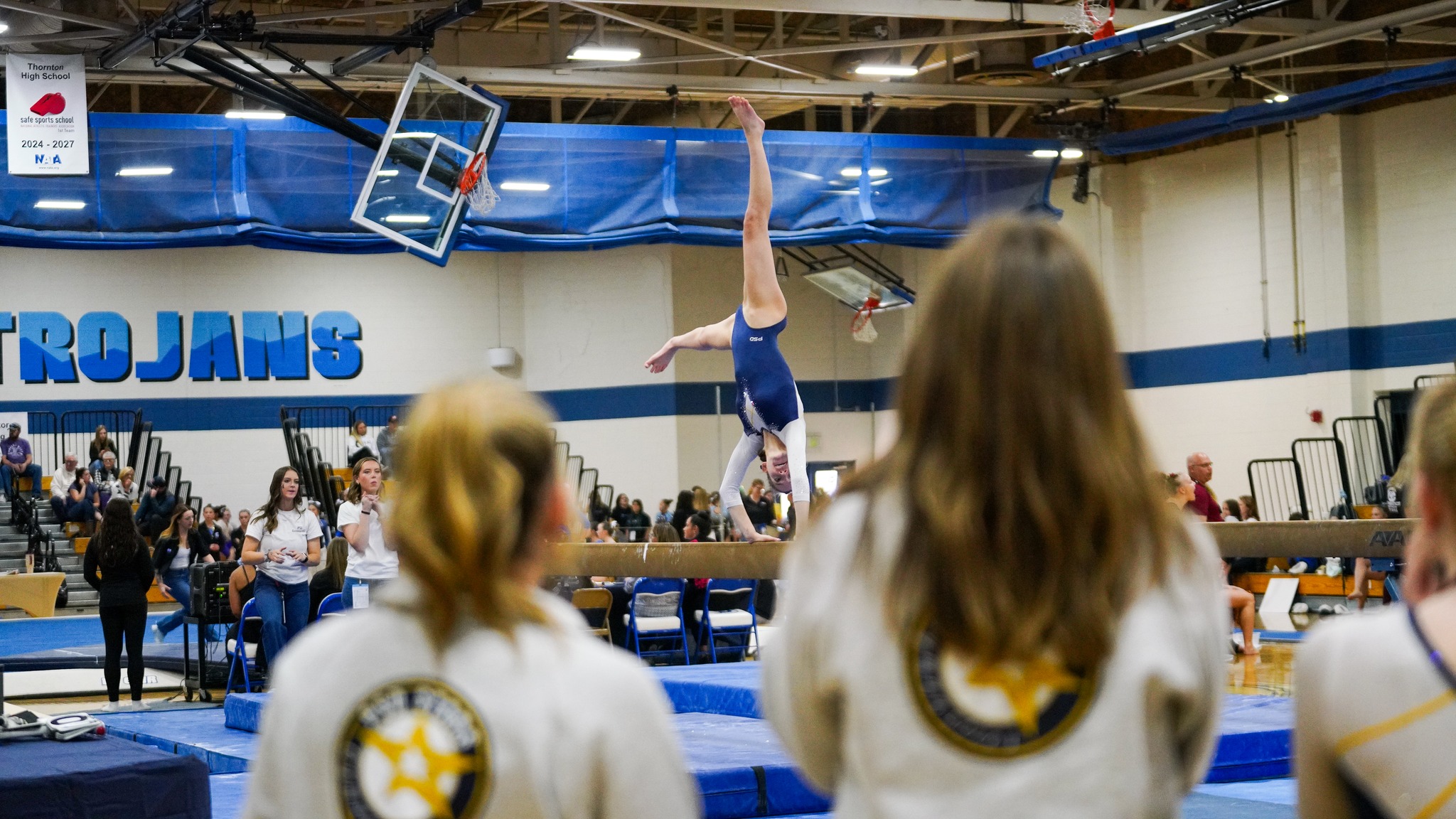 Gymnast on balance beam