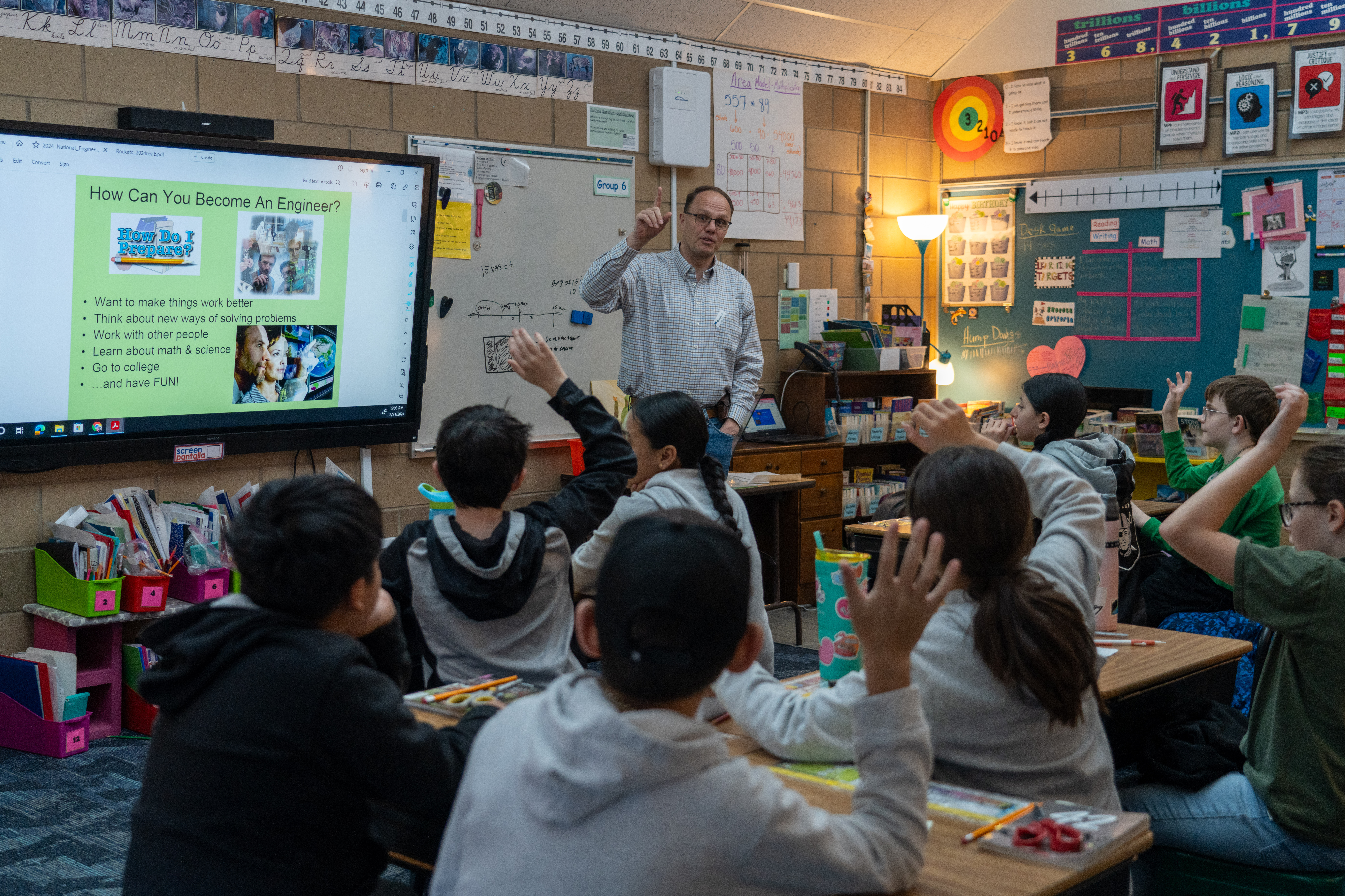 An engineer talks with PSD elementary students about his profession. 