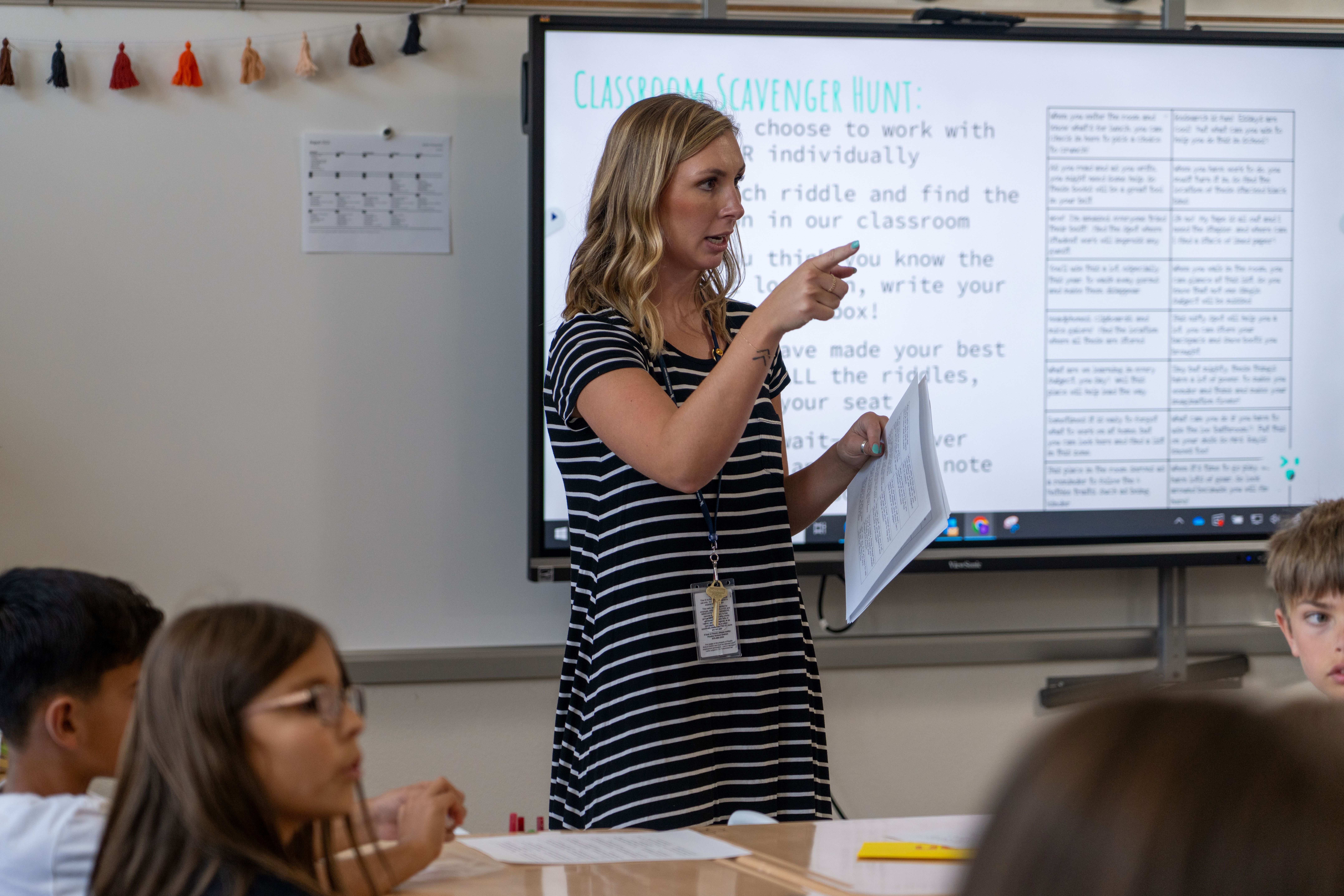 Emily Albertson teaches to students in her classroom.