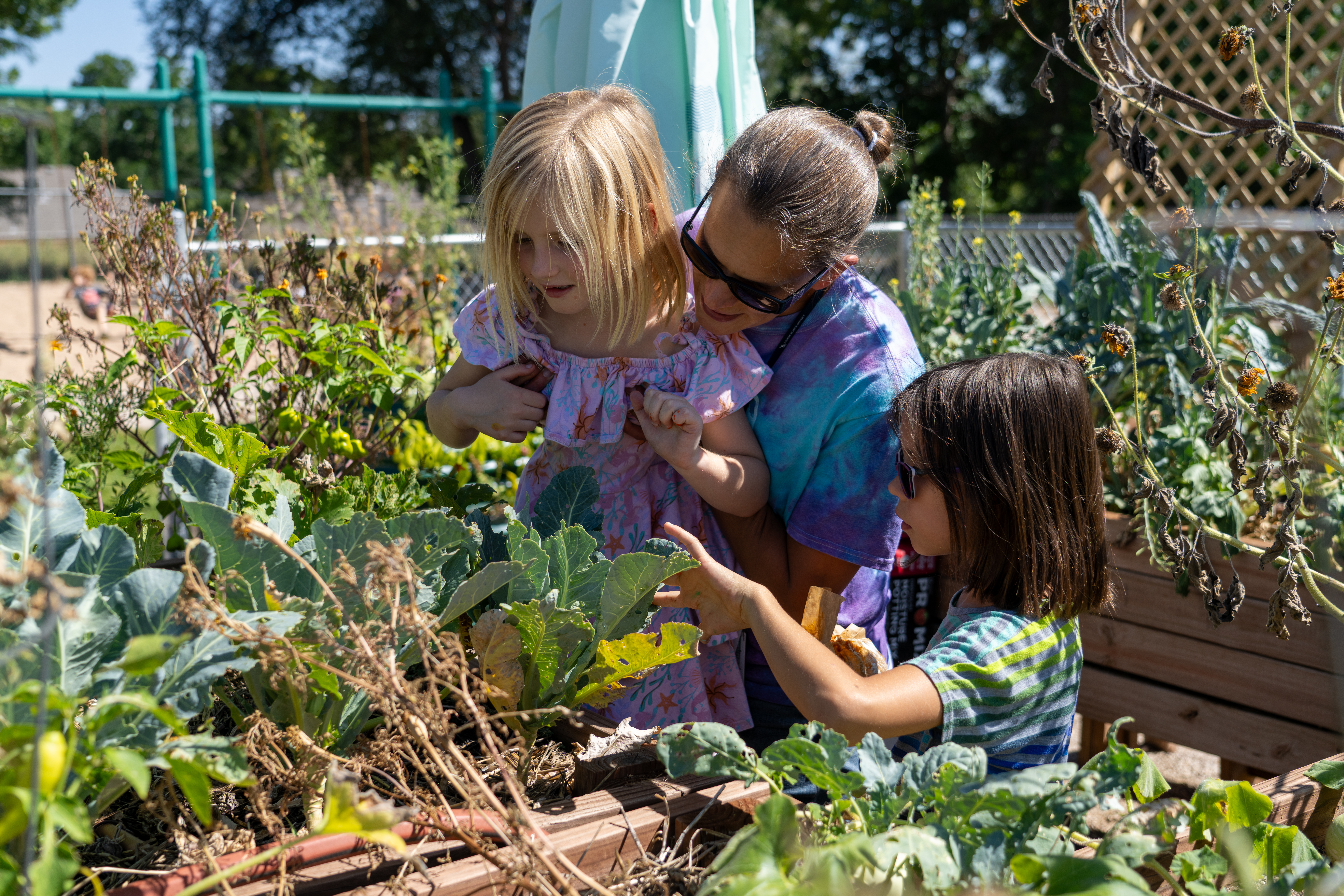Younger students enjoy the garden.
