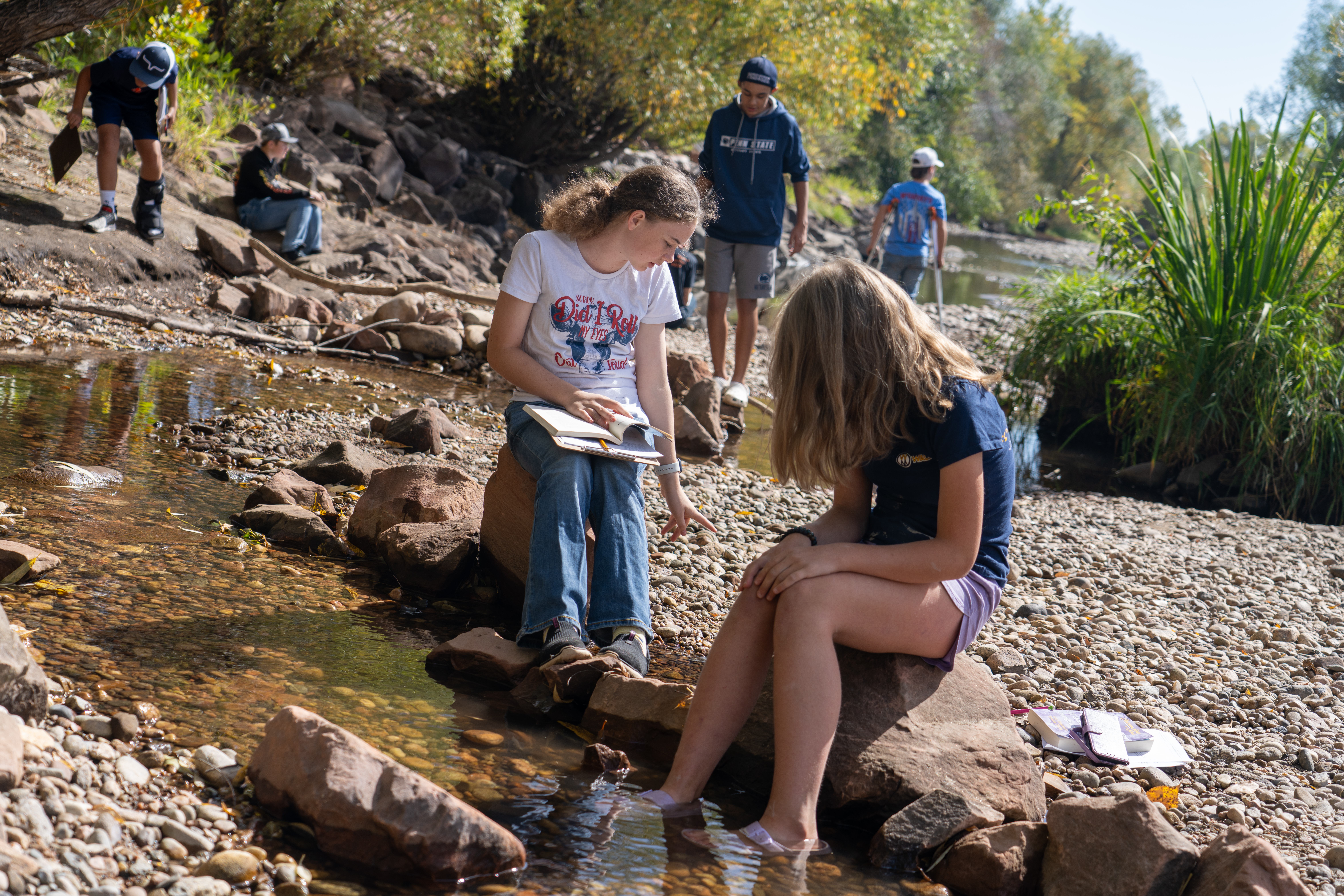 Students study the river during River Week. 