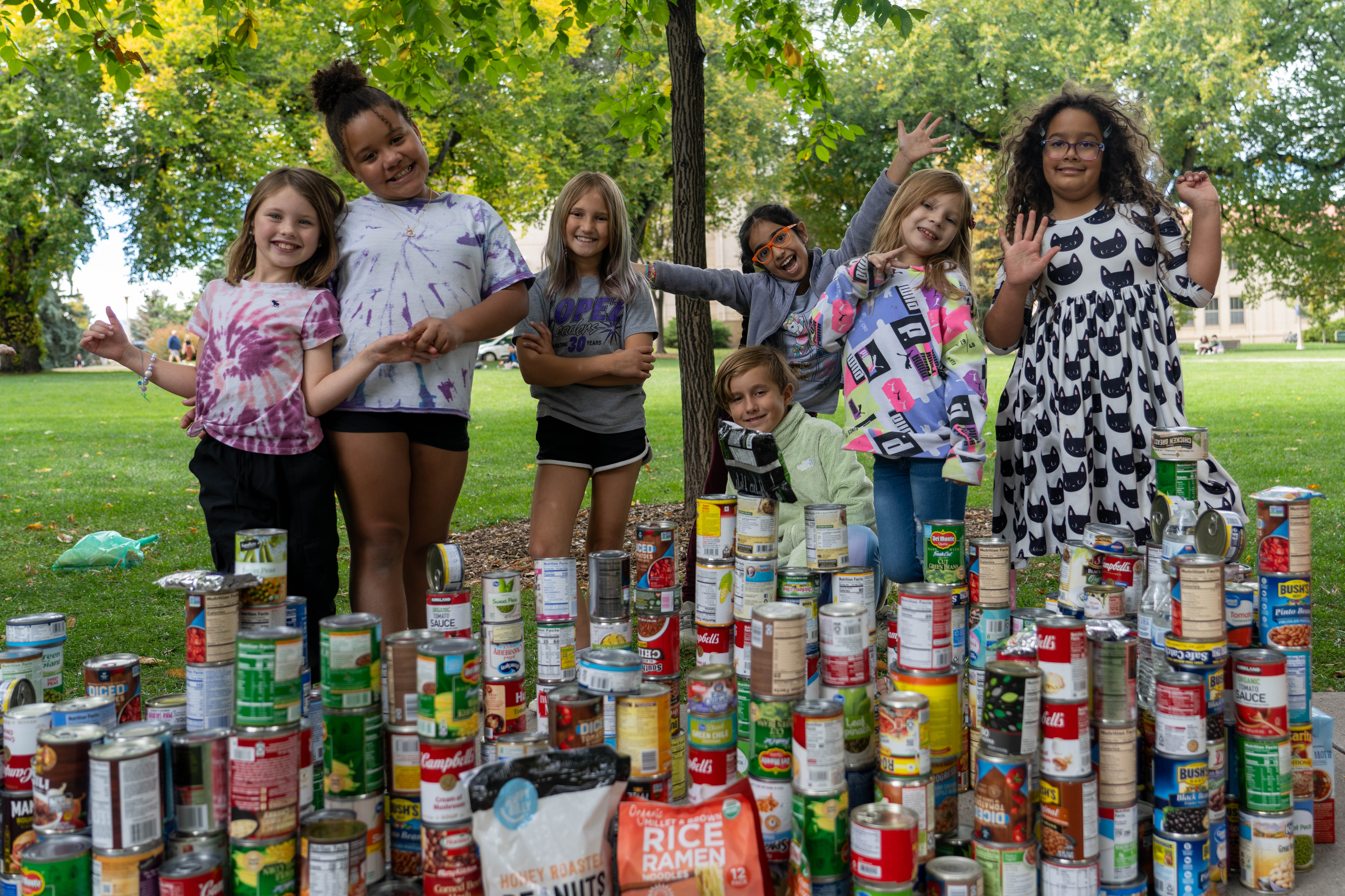 PSD students celebrate their construction out of cans for the CSU Cans Around the Oval competition.