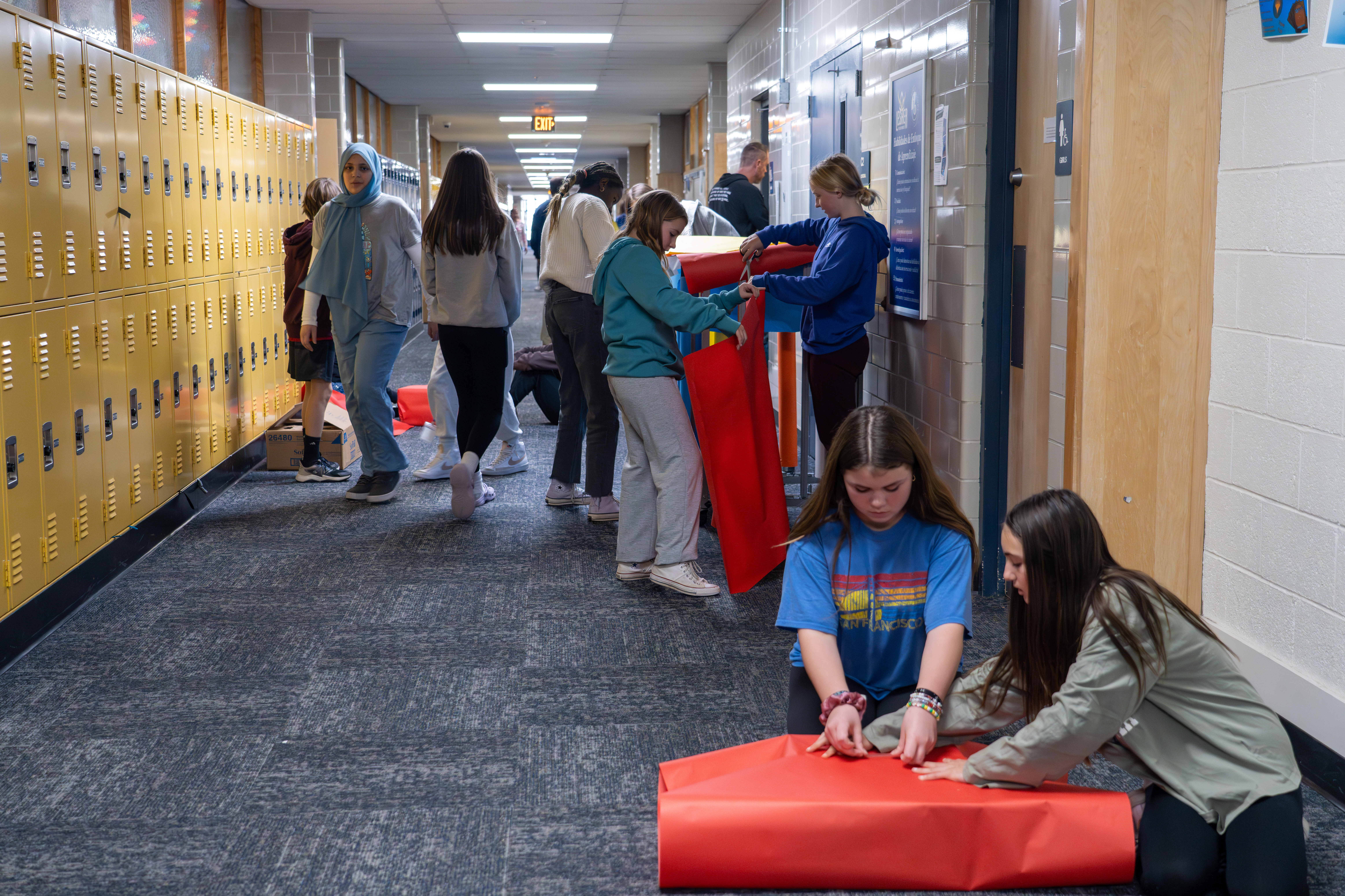 Lesher Middle School students wrap gifts. 