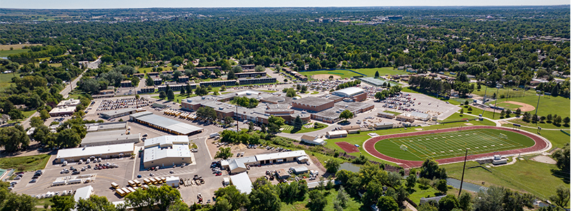 Drone shot of Poudre High School and the Johannsen Support Services Complex.