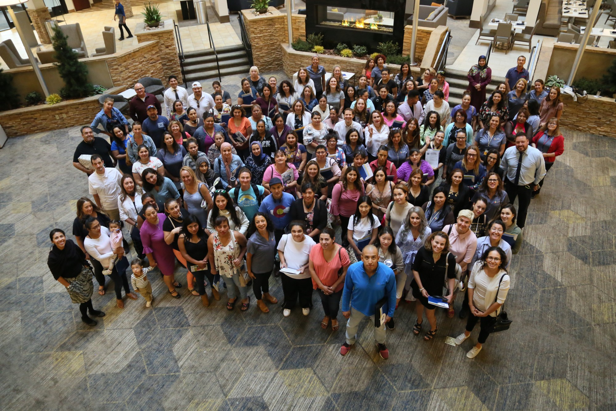 An overhead shot with all Parent Academy participants looking up.