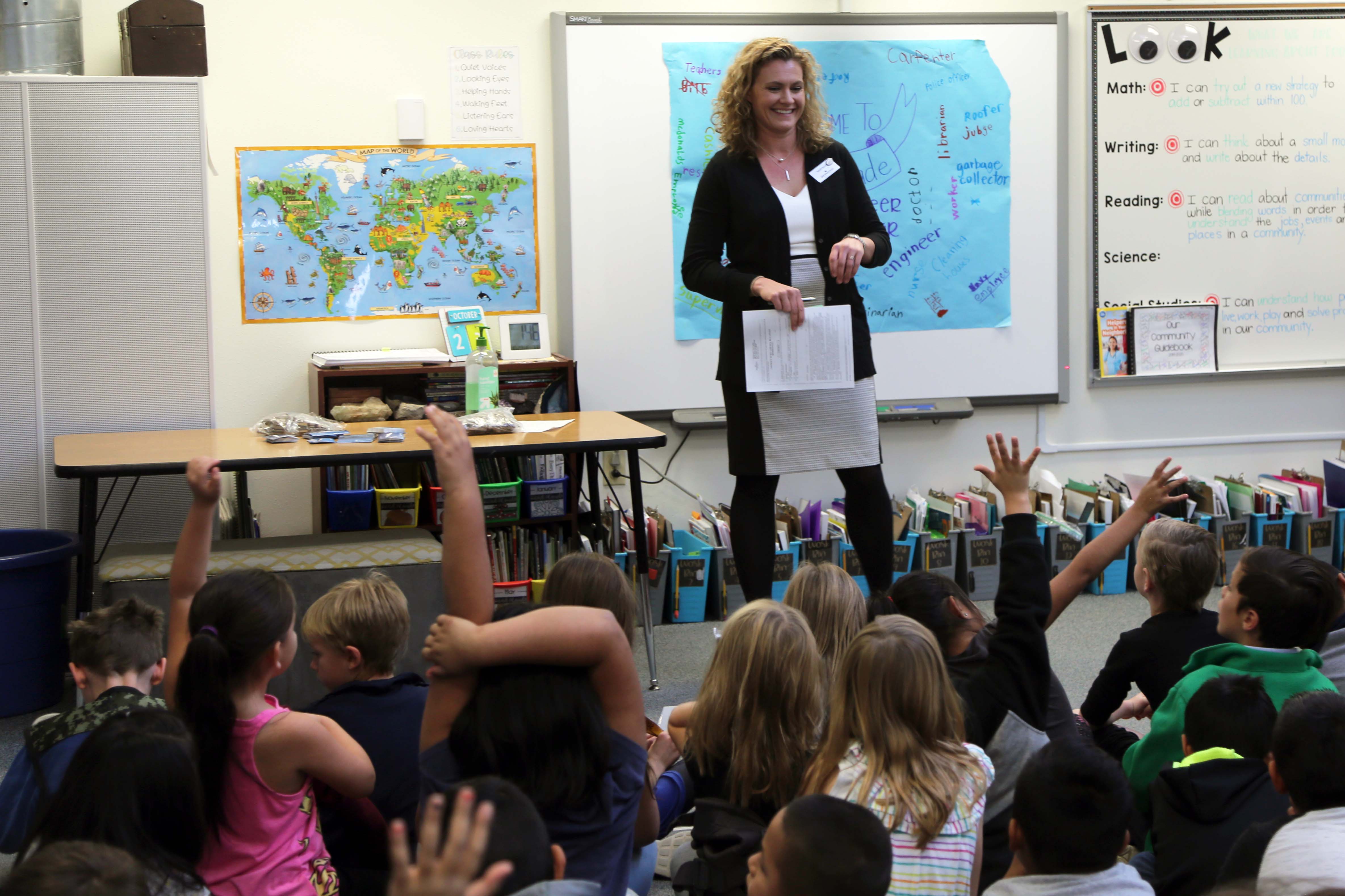 A Linton Elementary parent speaks to a class on Career Day.