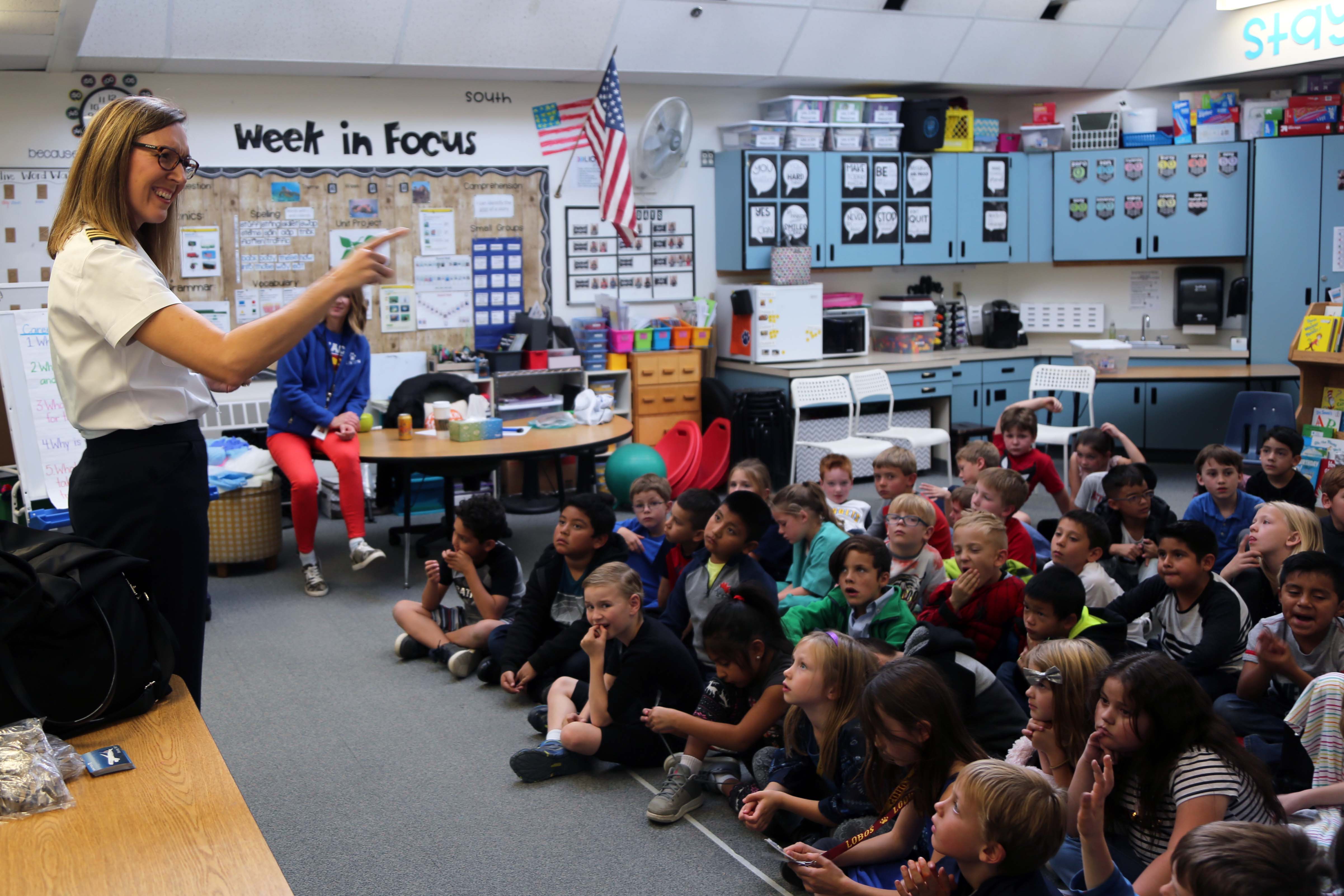 A pilot and mother of a Linton Elementary student talks to a class at Linton.