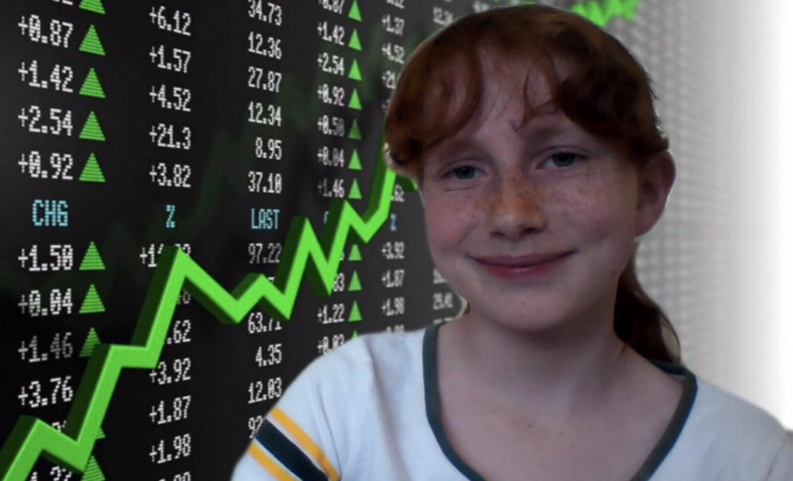 Lillian with image of stock market board behind her.