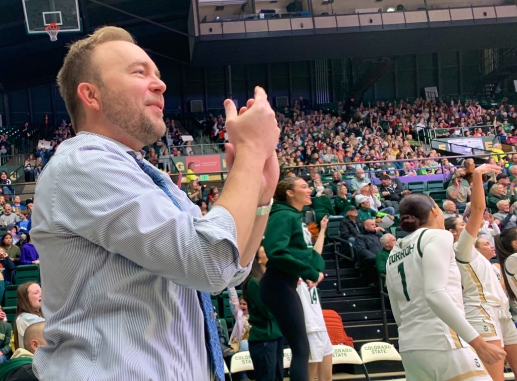 Superintendent Brian Kingsley cheers at the CSU basketball game on Education Day.