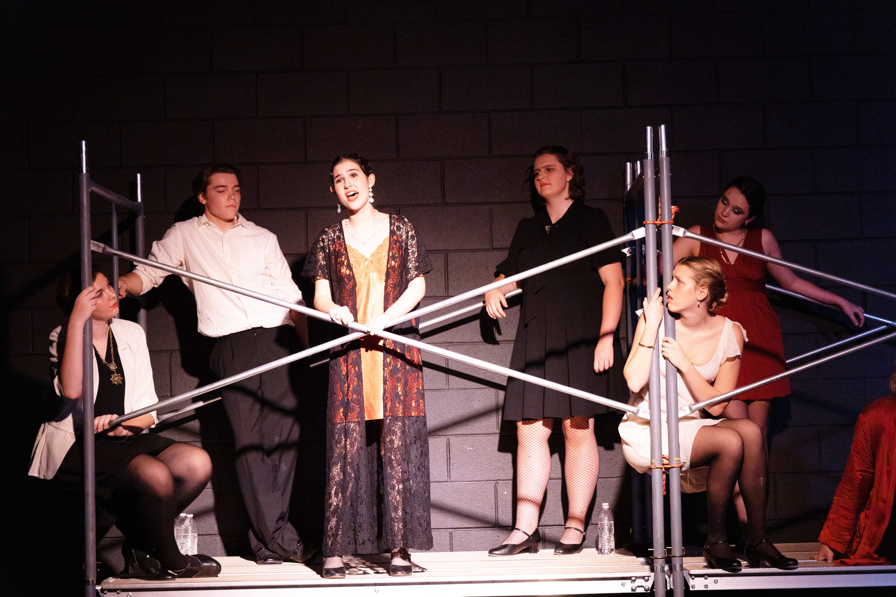 FCHS students perform the musical "Chicago" singing on stage.