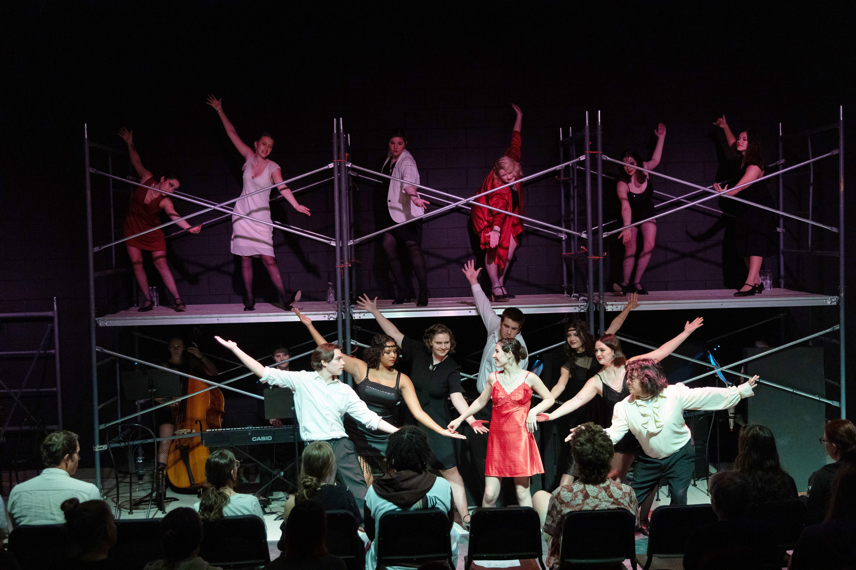 FCHS students perform the musical "Chicago" singing on stage.