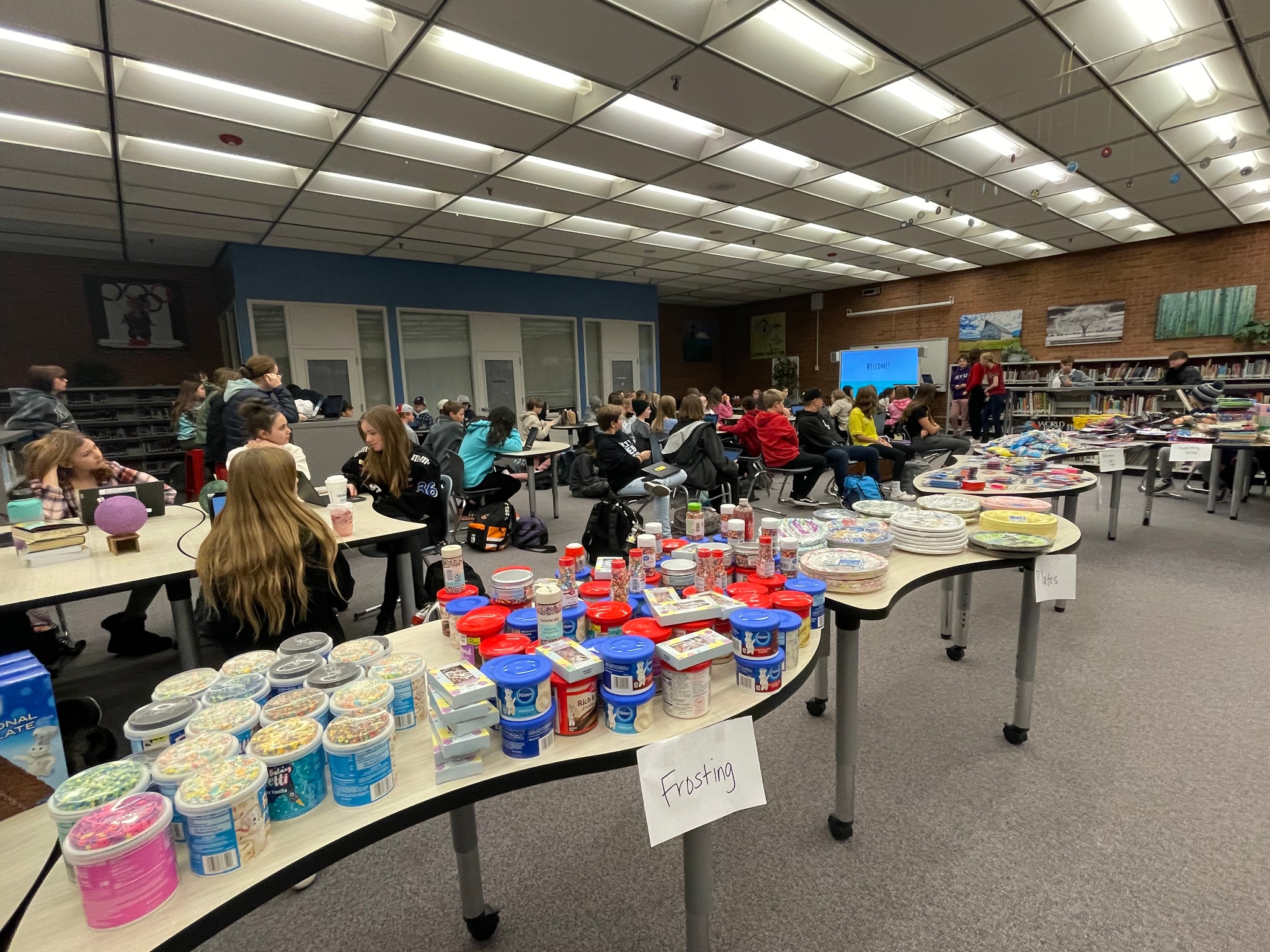 Boltz Middle School students organize birthday party kits to donate. 
