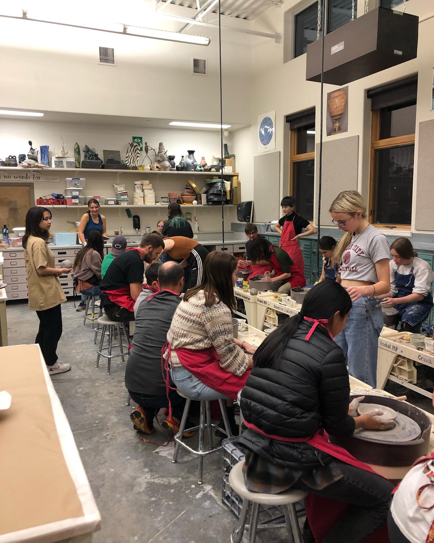 Fossil Ridge High School students make pottery bowls. 