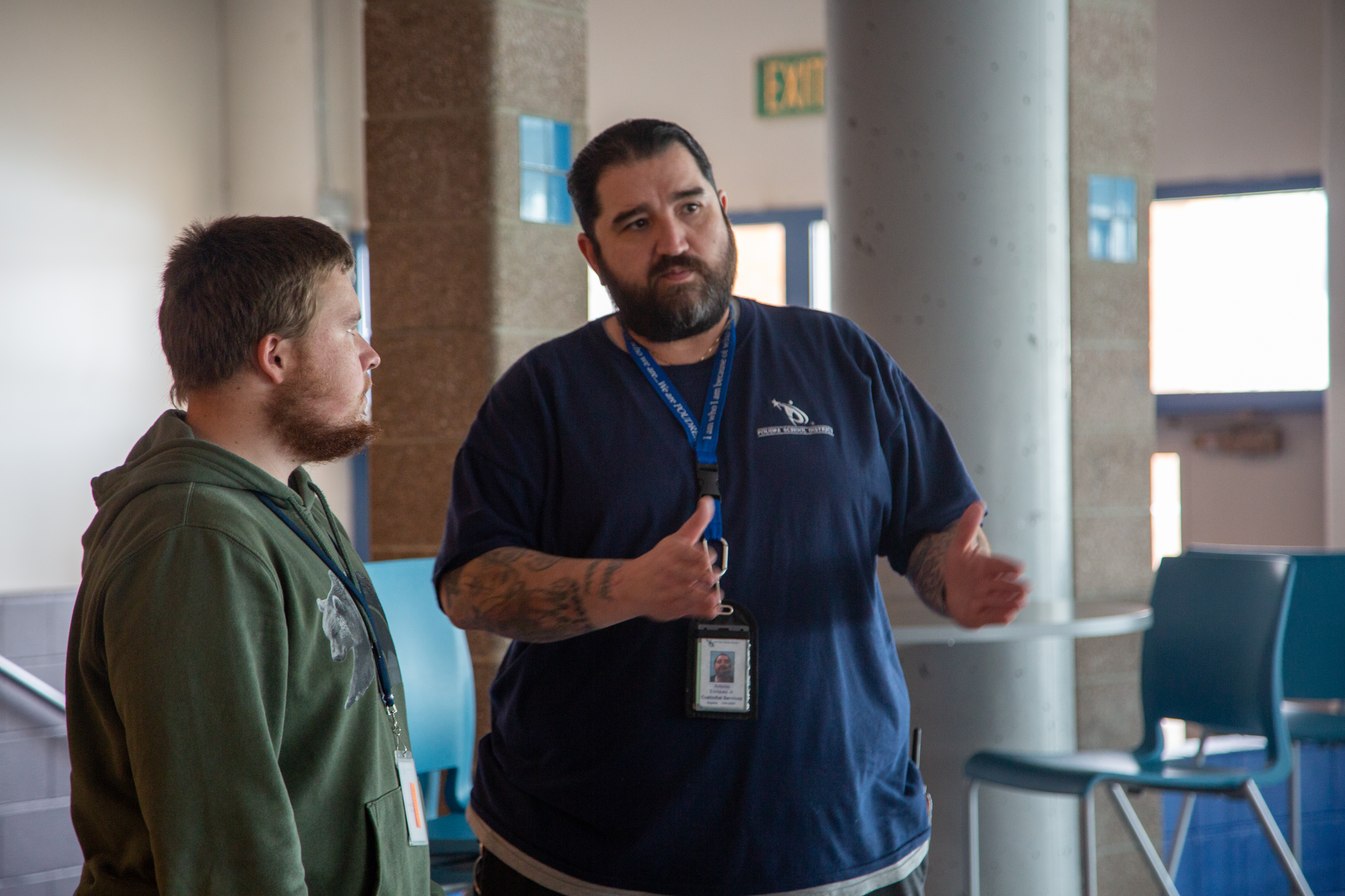 Antonio Enriquez Jr., PHS head custodian, with a colleague.