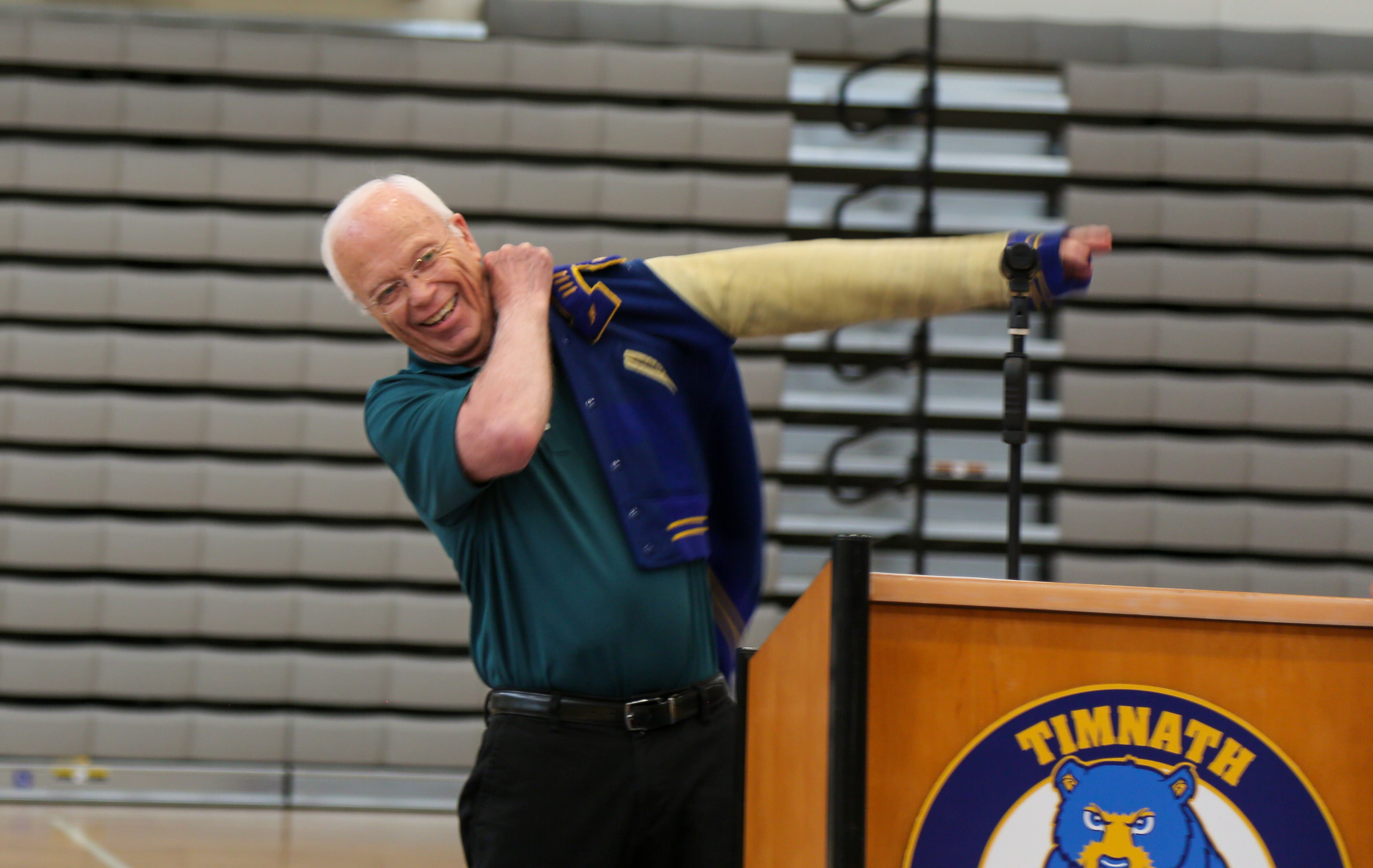 Timnath alumni Larry Siegfried, class of 1960, puts on his letter jacket from 62 years ago. 