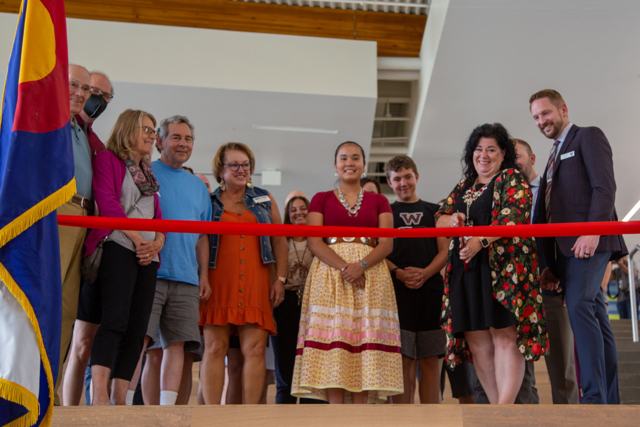 Staff for Wellington Middle-High School cut the ribbon to the new school!