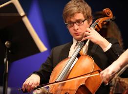 A music student plays the violin. 