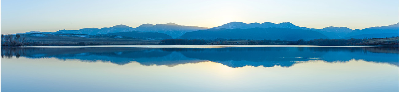 Front Range mountains and reflection mirrored below it.