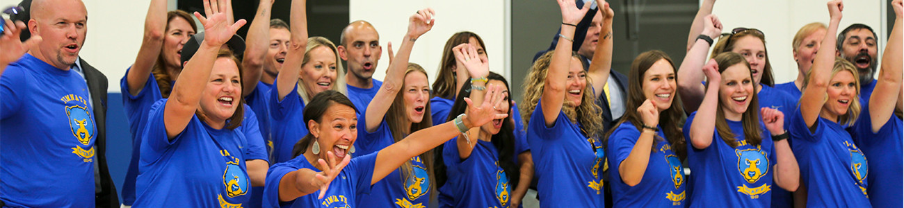 Timnath Middle High School staff show their excitement at the new school's opening celebration.