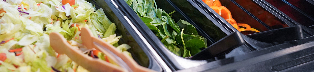 A salad bar at a school.