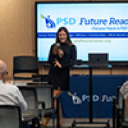 A student speaks to the audience at the Future Ready opening celebration. 